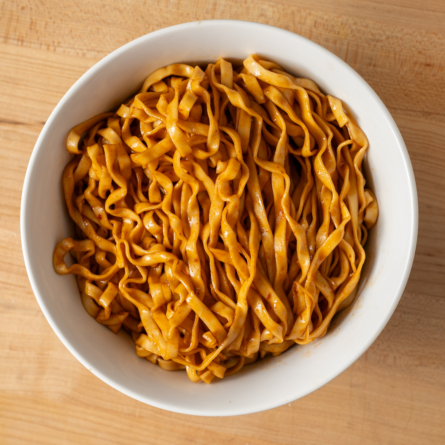 Spicy-Chili-Noodle-bowl_bc24374d-8b0c-491d-85c9-079c7c1260fe.png